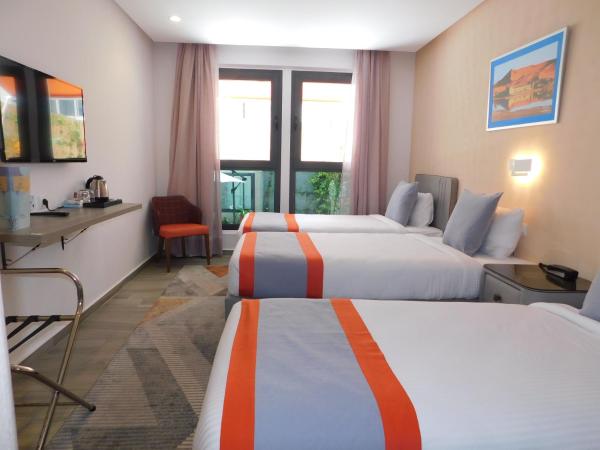 Gardenia Boutique Hotel : photo 2 de la chambre chambre triple confort