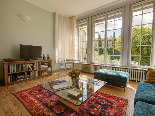 B&B Le Clos d'Argenson : photo 5 de la chambre suite double ou lits jumeaux avec vue sur le jardin - rez-de-chaussée