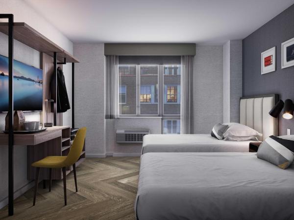 voco Times Square South New York, an IHG Hotel : photo 7 de la chambre chambre double standard avec 2 lits doubles