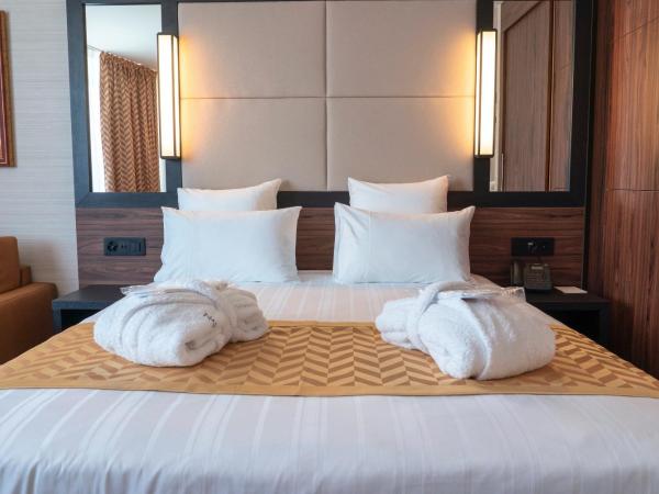 Nash Suites Airport Hotel : photo 5 de la chambre suite avec terrasse 