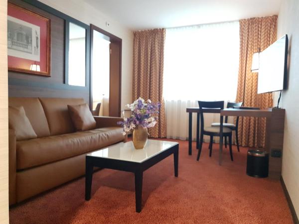 Nash Suites Airport Hotel : photo 1 de la chambre suite excutive