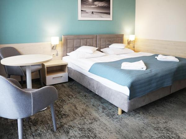 Apartamenty Nad Parsętą Szpitalna 7 : photo 4 de la chambre appartement (2-4 adultes)