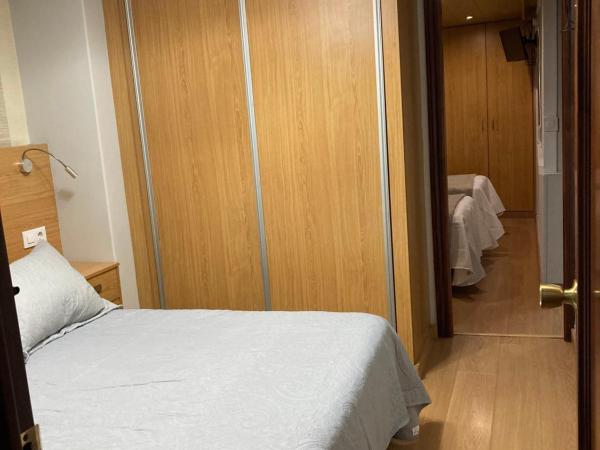 Hostal Crisol X Liste Station : photo 4 de la chambre chambre quadruple avec salle de bains privative