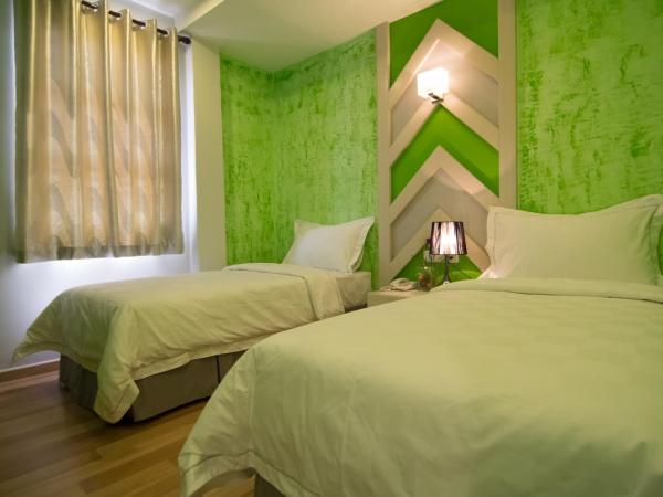 Sunshine Inn Plus : photo 5 de la chambre chambre lits jumeaux deluxe