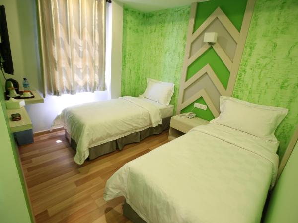 Sunshine Inn Plus : photo 8 de la chambre chambre lits jumeaux deluxe