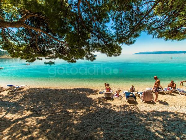 Beachfront Deluxe B&B : photo 2 de la chambre chambre triple de luxe avec balcon et vue sur la mer