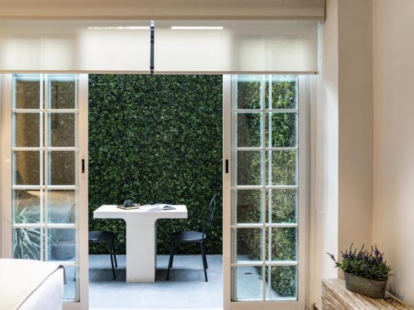 Reforma Guest House : photo 4 de la chambre appartement junior avec terrasse