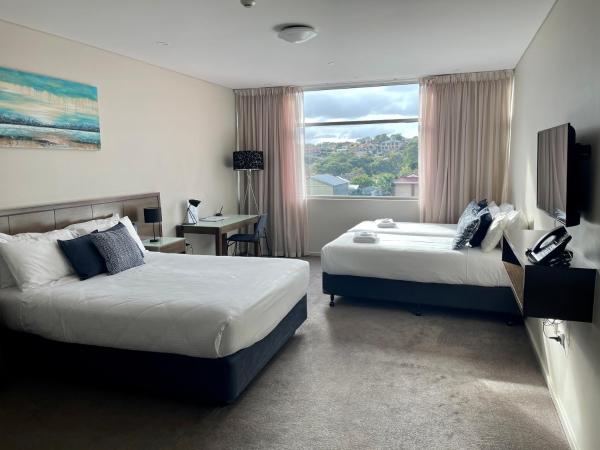 Sfera's Park Suites & Convention Centre : photo 1 de la chambre chambre familiale avec baignoire