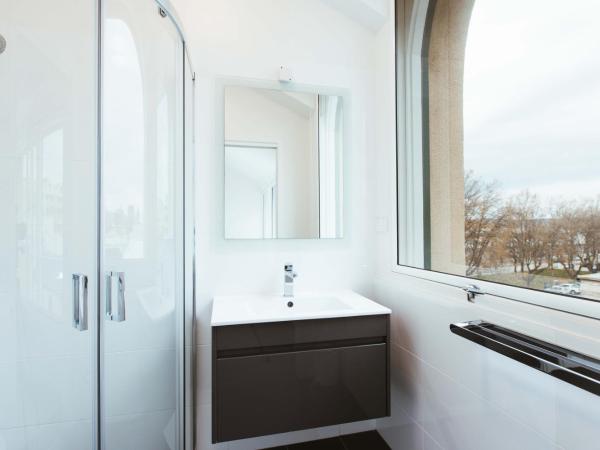 Salamanca Galleria Apartments : photo 7 de la chambre studio lit queen-size