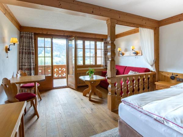 Geniesserhotel Le Grand Chalet : photo 1 de la chambre  chambre simple deluxe avec balcon - vue sur montagne