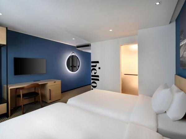 Travelodge Myeongdong City Hall : photo 3 de la chambre chambre lits jumeaux deluxe