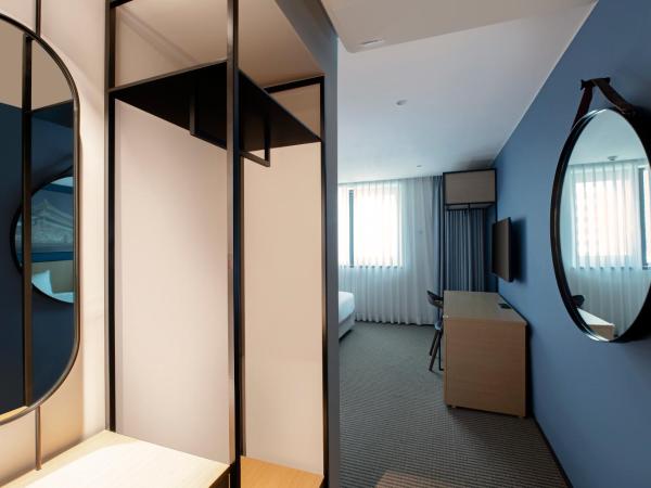 Travelodge Myeongdong City Hall : photo 4 de la chambre chambre lits jumeaux deluxe