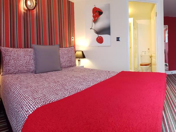 Robin 7 Lodge City Centre : photo 1 de la chambre chambre double de luxe avec salle de bains privative
