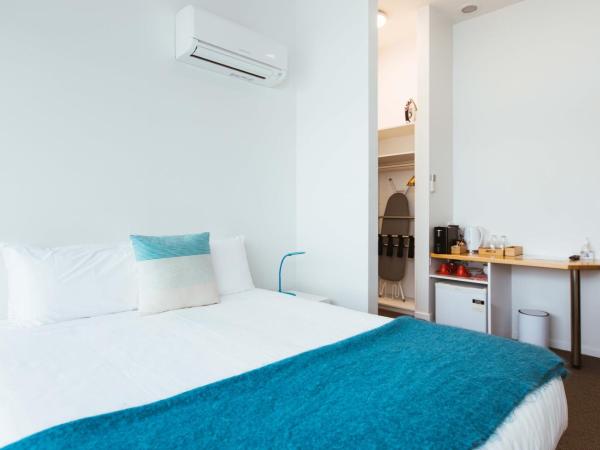 Salamanca Galleria Apartments : photo 6 de la chambre chambre lit queen-size