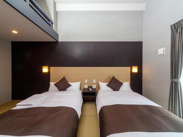 HOTEL SUITE HIROSHIMA HAKUSHIMA : photo 5 de la chambre chambre deluxe avec 2 lits doubles