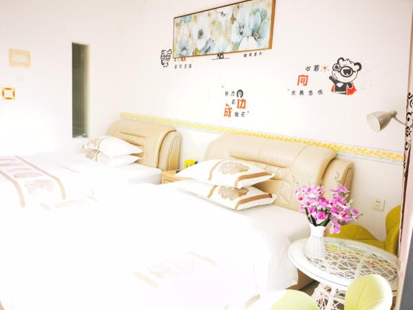 Guangzhou Victory Apartment : photo 6 de la chambre chambre lits jumeaux deluxe