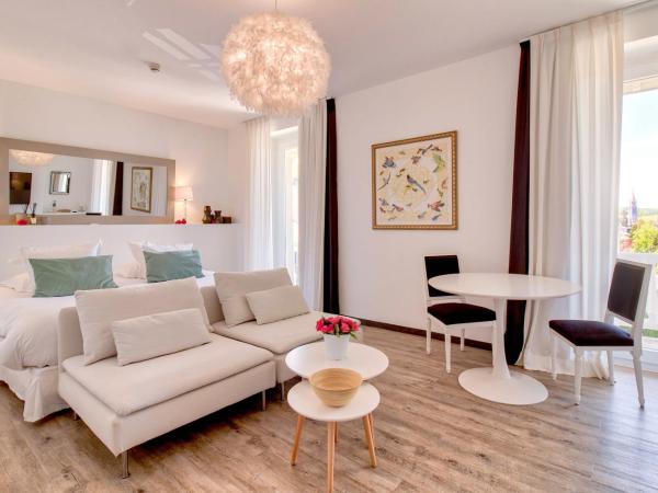 Belfry & Spa by Ligne St Barth : photo 1 de la chambre suite junior avec balcon et accès gratuit au spa - vue sur sanctuaire 