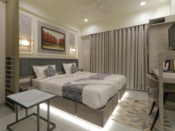 Hotel Elysian Residency : photo 6 de la chambre chambre deluxe double ou lits jumeaux