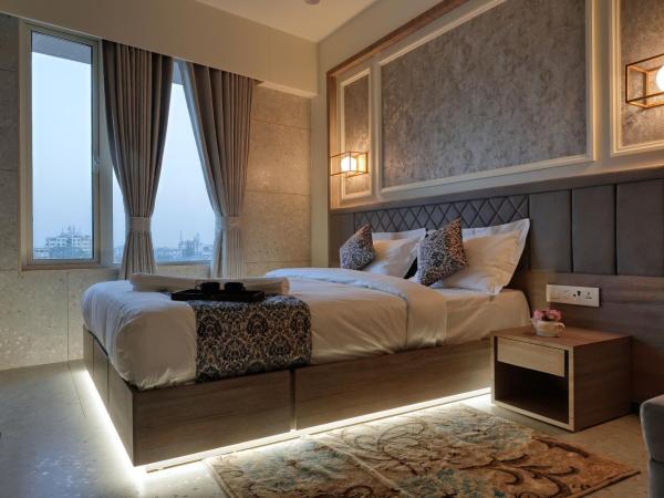 Hotel Elysian Residency : photo 3 de la chambre chambre deluxe double ou lits jumeaux