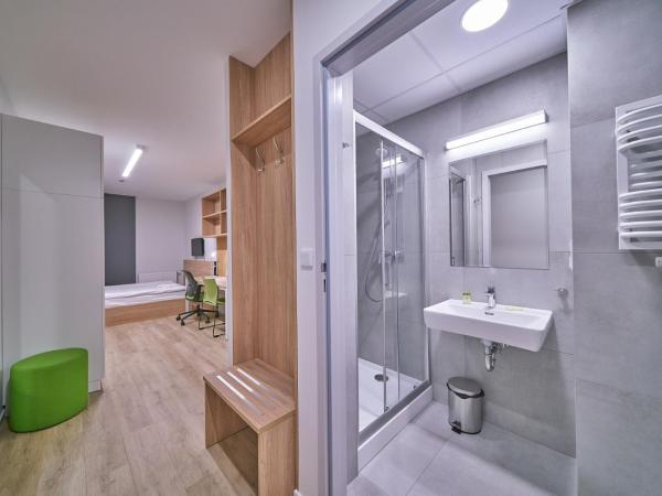 Apartamenty Collegia : photo 3 de la chambre petite chambre double
