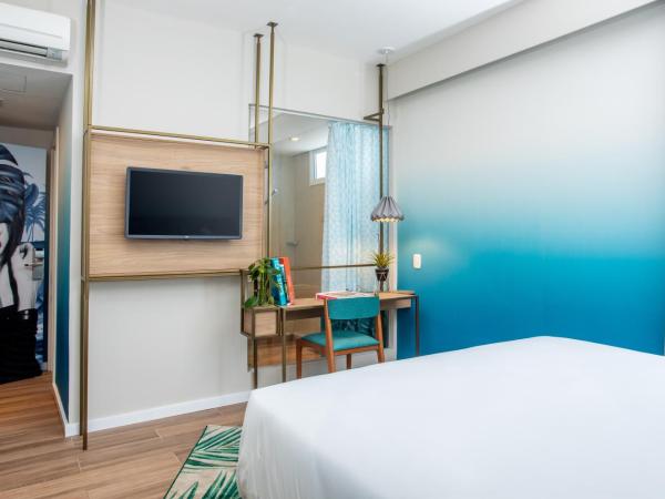 Mercure Rio Boutique Hotel Copacabana : photo 4 de la chambre executivo casal - varanda e vista lateral mar