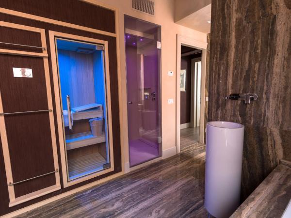 Liassidi Wellness Suites : photo 7 de la chambre suite lit king-size avec spa - bâtiment séparé