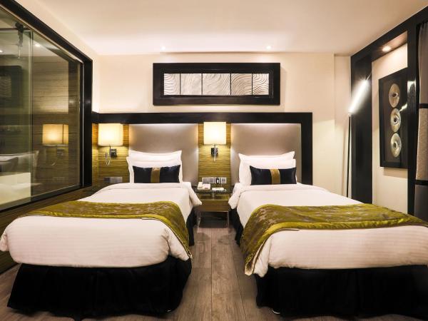 The Empresa Hotel : photo 5 de la chambre chambre lits jumeaux exécutive