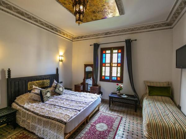Riad Jardin Chrifa : photo 2 de la chambre chambre quadruple - vue sur jardin