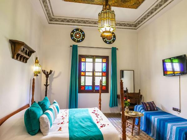 Riad Jardin Chrifa : photo 1 de la chambre chambre triple