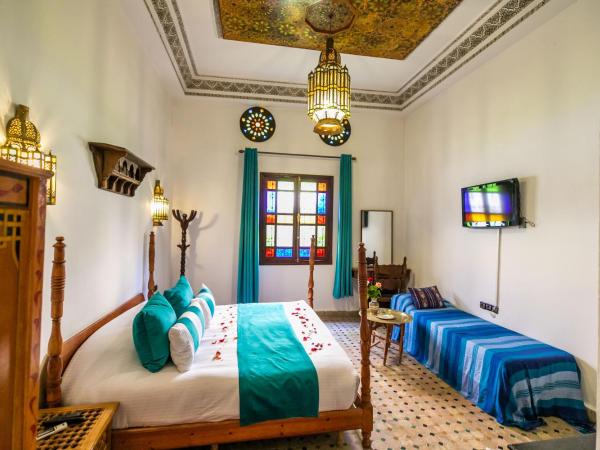 Riad Jardin Chrifa : photo 3 de la chambre chambre triple