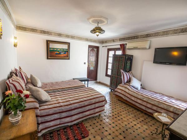 Riad Jardin Chrifa : photo 1 de la chambre chambre triple