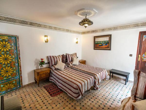 Riad Jardin Chrifa : photo 2 de la chambre chambre triple