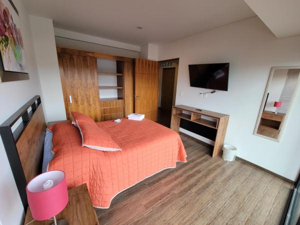 Del Parque Suites : photo 3 de la chambre chambre double avec salle de bains commune