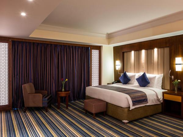 Royal Tulip Muscat : photo 4 de la chambre chambre lit king-size deluxe