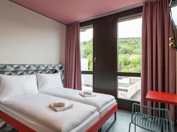 MEININGER Hotel Zürich Greencity : photo 3 de la chambre chambre lits jumeaux