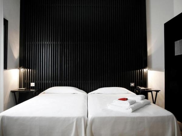 Hotel Market : photo 1 de la chambre chambre double ou lits jumeaux avec parking