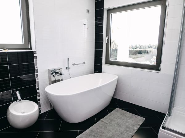 Residence Vaal : photo 8 de la chambre king suite with jacuzzi on the terrace and sea view