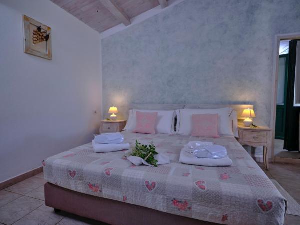 LOCANDA MURALES - Turismo rurale : photo 7 de la chambre chambre double - vue sur jardin
