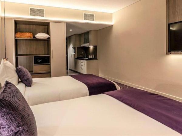 Leva Hotel and Suites, Opposite Downtown : photo 4 de la chambre hébergement lits jumeaux deluxe - vue sur atrium