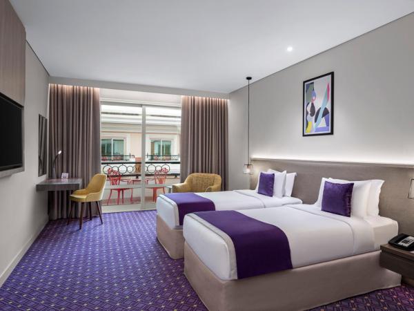 Leva Hotel and Suites, Opposite Downtown : photo 2 de la chambre hébergement lits jumeaux deluxe - vue sur atrium