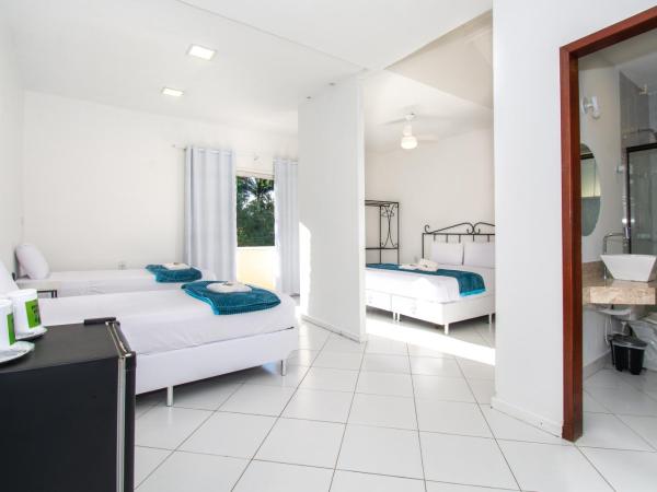 Pousada Casuarina Ferradura : photo 1 de la chambre chambre quadruple
