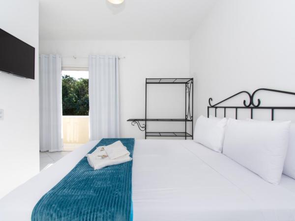 Pousada Casuarina Ferradura : photo 2 de la chambre chambre quadruple