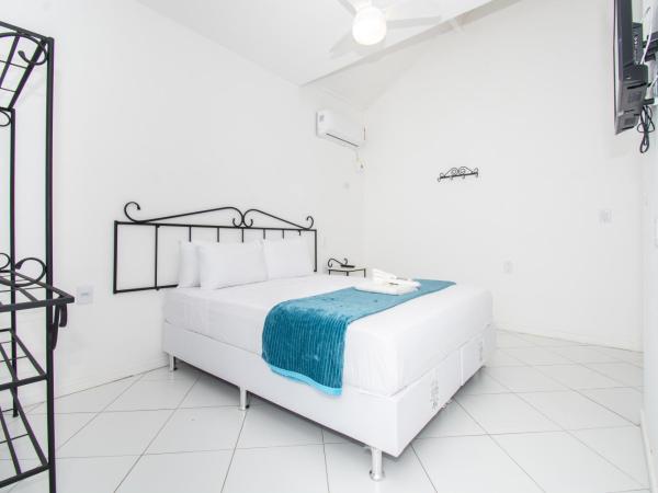 Pousada Casuarina Ferradura : photo 4 de la chambre chambre quadruple