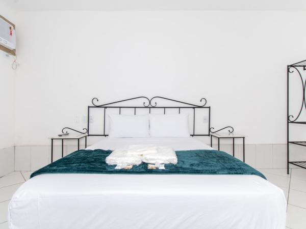 Pousada Casuarina Ferradura : photo 1 de la chambre chambre double