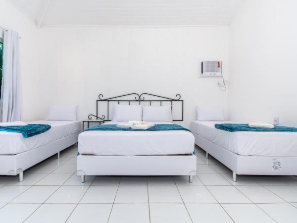 Pousada Casuarina Ferradura : photo 7 de la chambre chambre quadruple