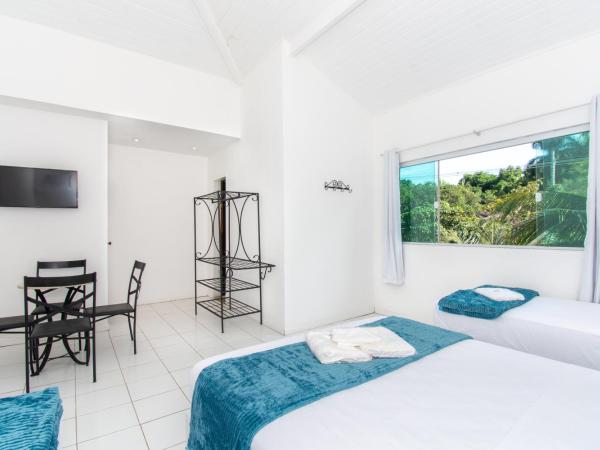 Pousada Casuarina Ferradura : photo 8 de la chambre chambre quadruple