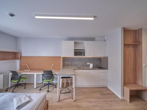 Apartamenty Collegia : photo 2 de la chambre grande chambre double 