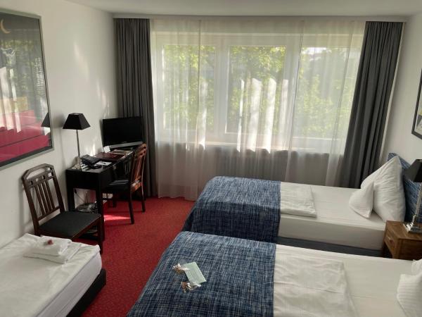 Hotel Nymphenburg City - München : photo 1 de la chambre chambre triple