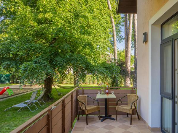 Hotel Solero : photo 3 de la chambre chambre lits jumeaux - vue sur jardin