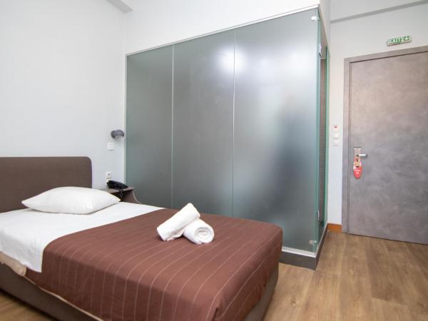 Athens Hawks : photo 4 de la chambre chambre simple avec salle de bains privative